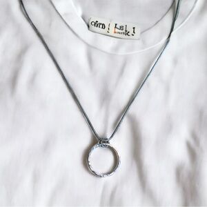 Sterling silver circle pendant NWT.